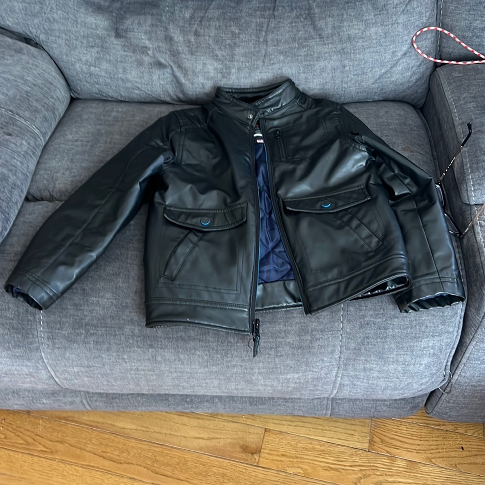 Leather like boys jacket no wear and tear size 8